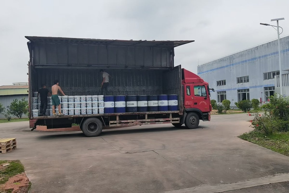 Truck loaded with private label pails and drums