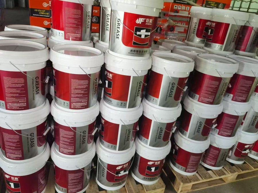 Private label grease pails stacked on pallets