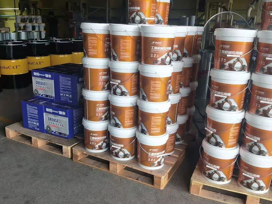 Branded grease pails and cartons ready for dispatch