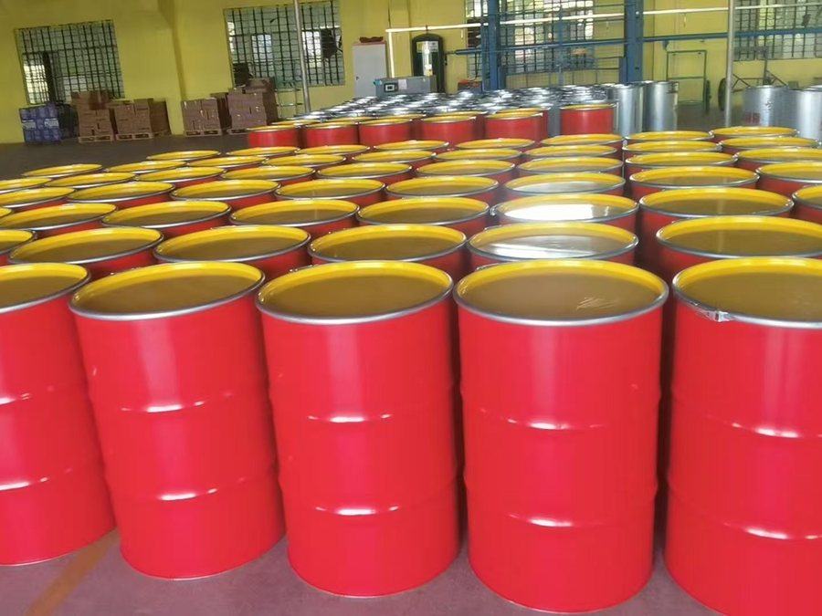 180 kg open-head drums with yellow lids